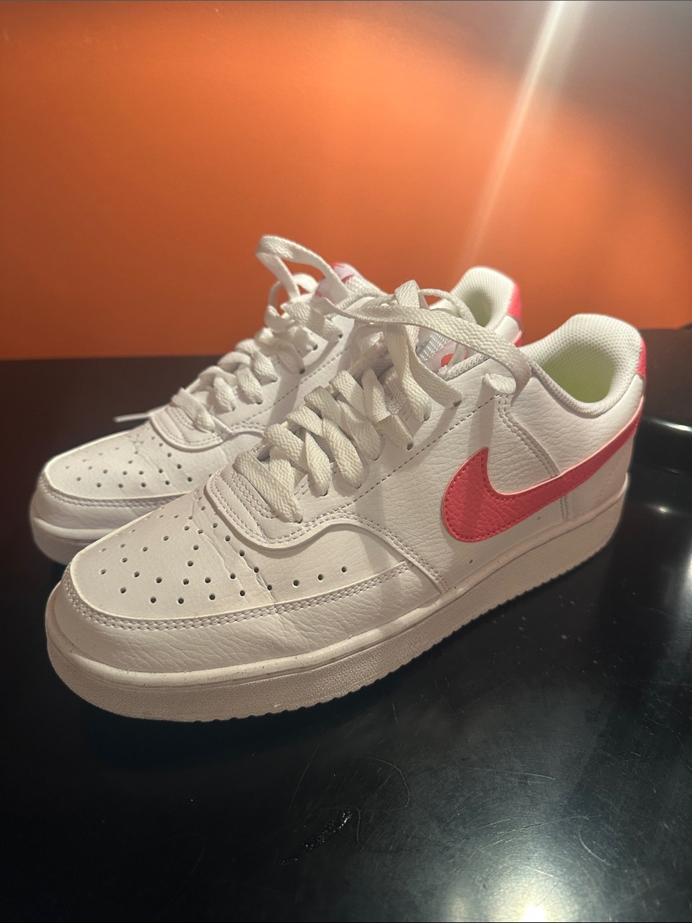 Nike White womens Sneakers with Pink Swoosh